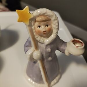 Goebel Holiday Figurine with Yellow Star and Lavender Coat